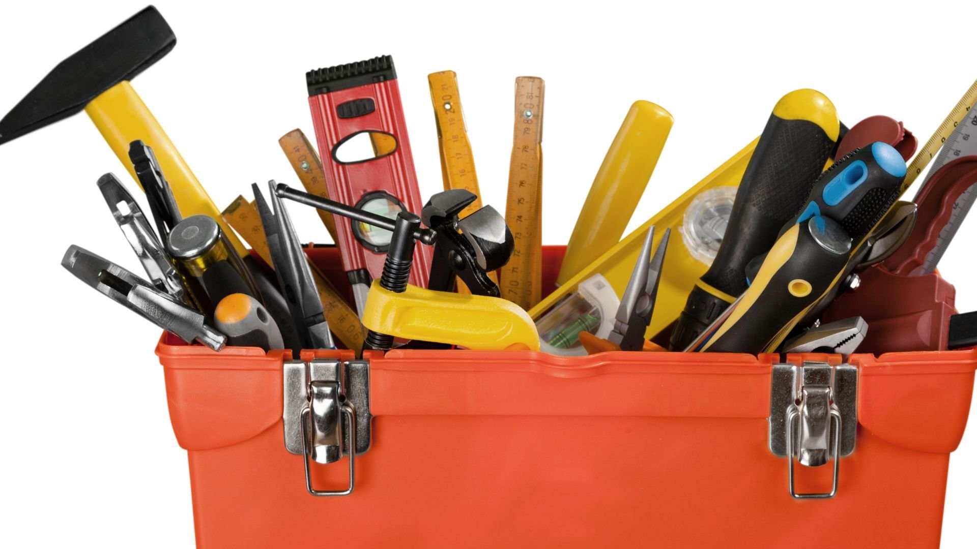 An orange toolbox filled with assorted hand tools, including a hammer, screwdrivers, pliers, levels, clamps, and rulers.