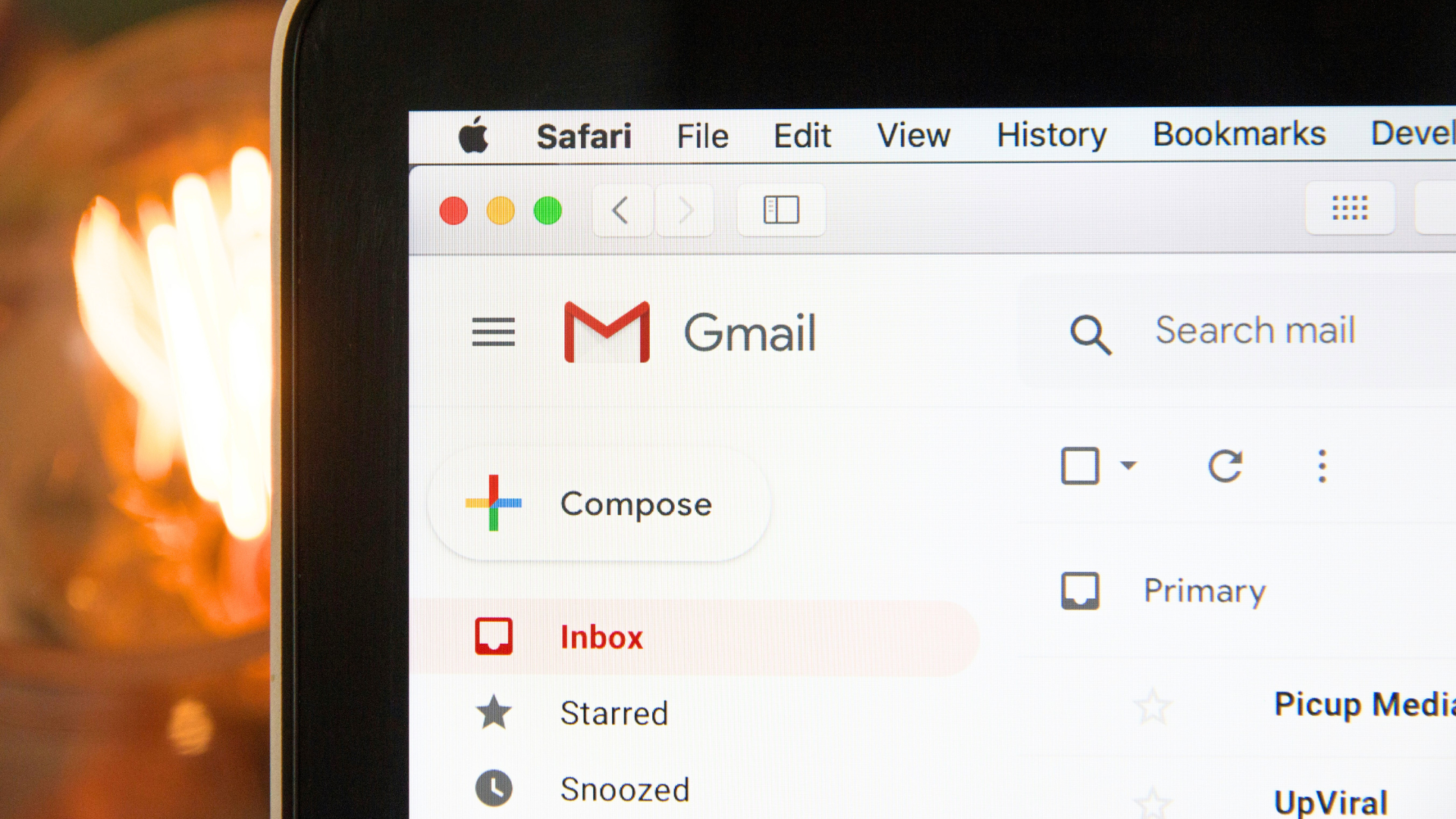 Laptop computer with an internet browser window open showing a Gmail inbox