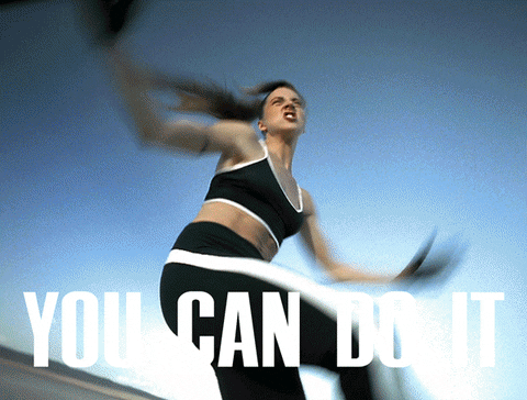 Sporty Spice does a karate jump-kick while the text "You can do it" appears on the screen