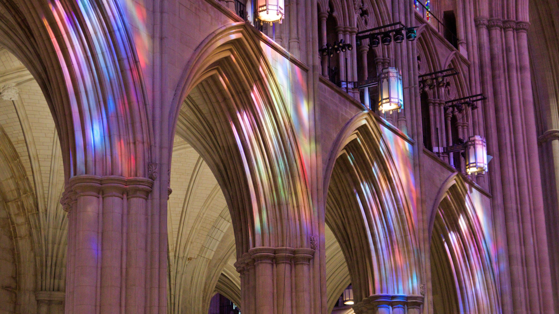 a large cathedral with a lot of light coming through the windows